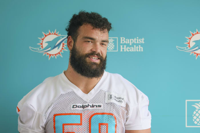 Jul 26, 2023; Miami Gardens, FL, USA; Miami Dolphins guard Connor Williams (58) talks to reporters during training camp at Baptist Health Training Facility.